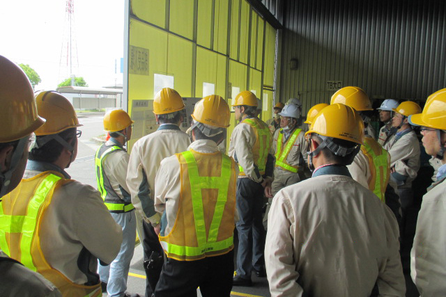 Photo:A company president performing a fire safety inspection