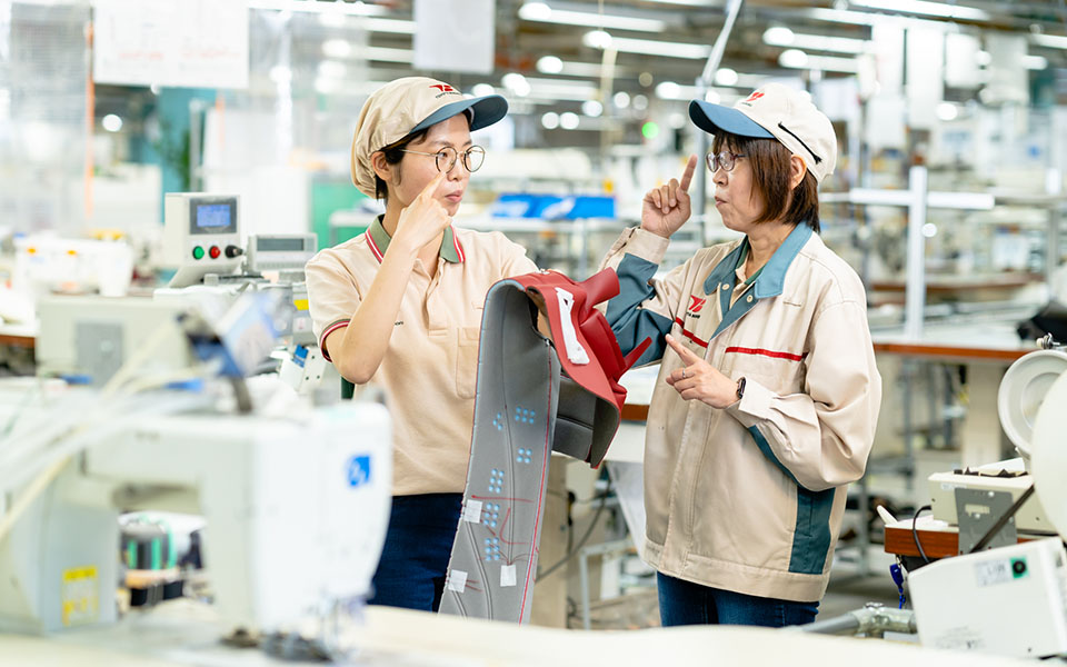 Original sign language to facilitate communication with hearing-impaired company members